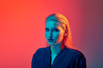Fototapeta premium Fashion photo-sessia with a beautiful girl. Bright make-up.