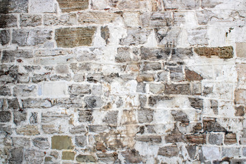Old stone and brick wall as background, pattern or texture