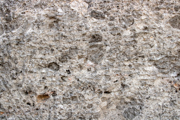 Old stone and brick wall as background, pattern or texture