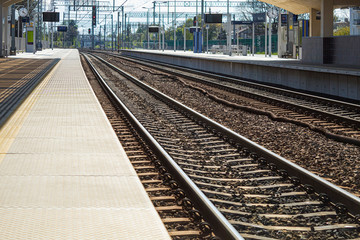 Station platform and railway tracks