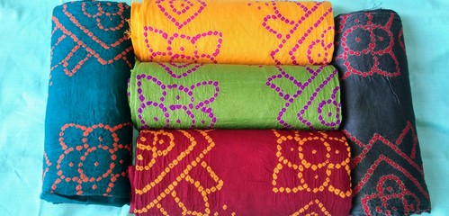 Bandhej dress materials. Bandhej which is also called Bandhani is widely used in Gujarat and Rajasthan in India.