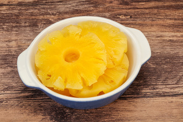 Marinated pineapple rings in the bowl