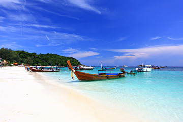 Fototapeta premium Longboats and scenic view on Koh Lipe beach Andaman Sea, Satun province, Thailand 