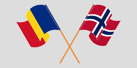 Crossed and waving flags of Romania and Norway