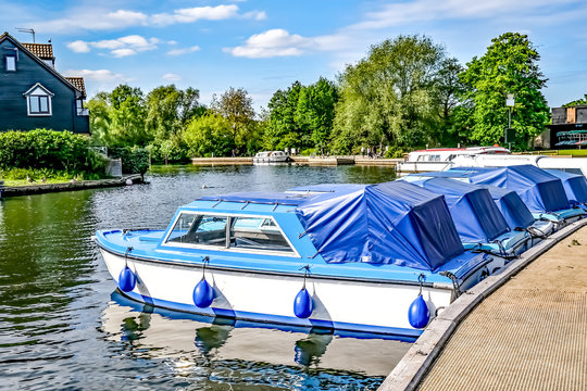 Wroxham, Norfolk, UK &ndash; May 17 2020.  During the Covid19 lockdown the boats are moored and the tourists are nowhere to be seen.