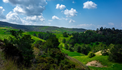Fototapeta na wymiar Water meadows and hills on the Mediterranean coast on the island of Cyprus.