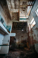 Fototapeta na wymiar Old broken empty abandoned industrial building interior