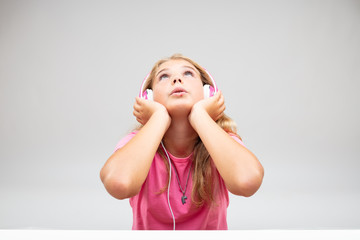 Young girl immersed in listening to her music