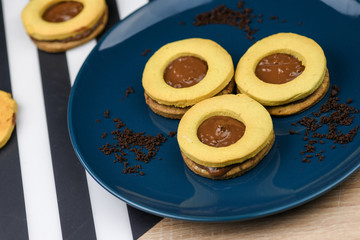 Round sandwich biscuits stuffed with chocolate