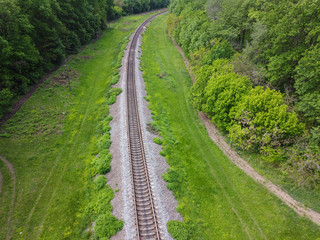 Fototapeta na wymiar Road for the train, railway tracks outside the city where beautiful nature and fresh air.