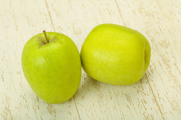 Two ripe green sweet apples