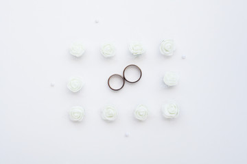Wedding rings close-up on a white background. The concept of marriage.