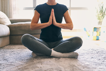 Young woman practicing yoga in various poses. Lotus asana