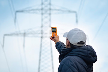 Electromagnetic radiation measuring under high voltage power transmission towers