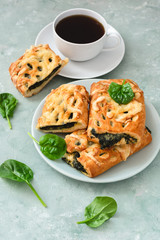 Pastries with feta cheese and spinach.Greek pie spanakopita.