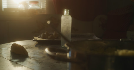 Baker prepares the cake using various ingredients