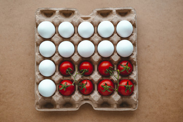 tomatoes and eggs lined up in a row