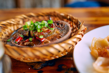 Vietnamese seafood in a pot boiling with crab and spices 