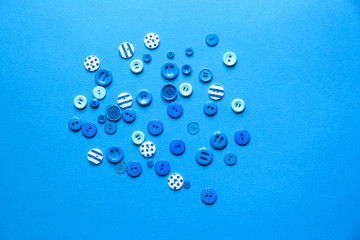 Flat lay with colorful sewing buttons, mock up, top view.