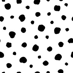 Vector seamless polka dots pattern in a chaotic manner. Hand drawn, doodle style. Design for fabric, wrapping, wallpaper, textile