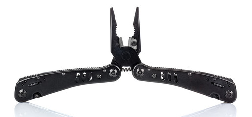 Open pliers of black multi tool knife isolated on white background with reflection on glossy surface. Multipurpose knife close-up image