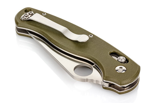 Closed folding pocket knife with textured dark green composite plastic cover plates on steel handle isolated on white background with reflection on glossy surface. Pocket knife close-up image