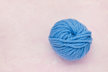 Ball of woolen thread for knitting.