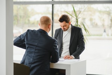 The seller and the buyer in the auto show