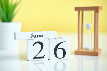 26 twenty sixth day june Month Calendar Concept on Wooden Blocks.