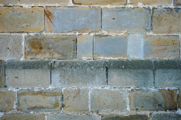 muro de piedra de arenisca gris de la iglesia