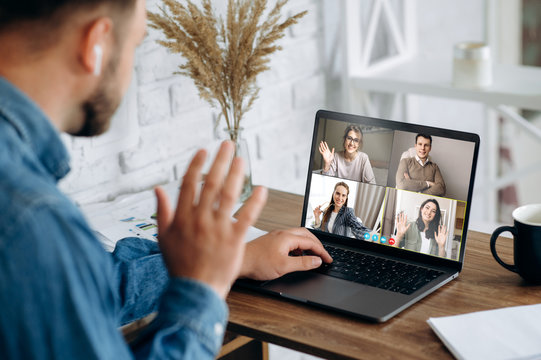 Communication by video conference. Close up photo of laptop screen with people. Business colleagues discuss about economic trends by video conference from home. Distant work