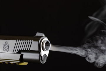 Springfield Operator 45 Cal with gun smoke