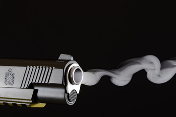 Springfield Operator 45 Cal with gun smoke - obrazy, fototapety, plakaty