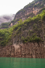 Wushan, Chongqing, China - May 7, 2010: Mini Three Gorges on Daning River. White cloudscape...