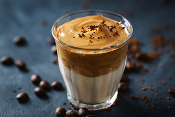 Dalgona coffee with whipped foam in cup