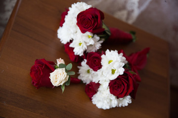 Bouquets of flowers on a wooden board

