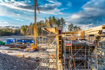 Close up photo of new bridge building site with timbering construction for further filling it with...