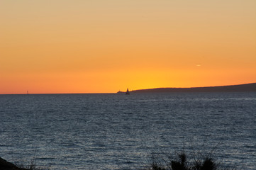 Fototapeta na wymiar sunset in Arenal beach in Mallorca