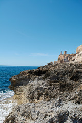 Fototapeta na wymiar Cala Figuera - beautiful coastline and view of old lighthouse in Cala Figuera, Mallorca, Spain