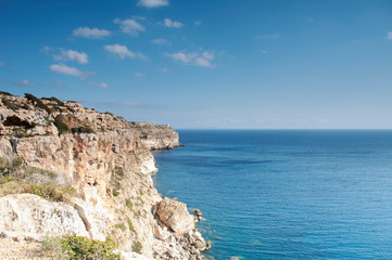 Fototapeta na wymiar Far de Cap Blanc at Mallorca, Spain cliffs view, lighthouse, cabrera island
