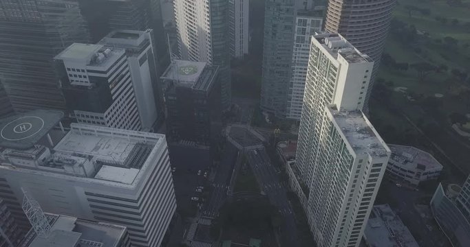 Ungraded, Aerial flight above high rise building, Helipad view, Urban city, Drone, 4K