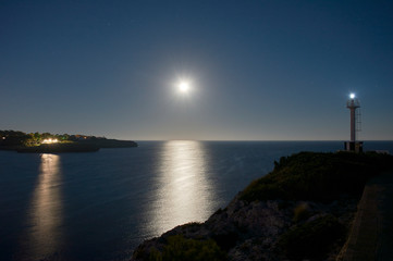 Fototapeta premium Village of Portopetro, at night as seen from a sailboat in the Marina, Majorca, Balearic Islands, Spain, Europe