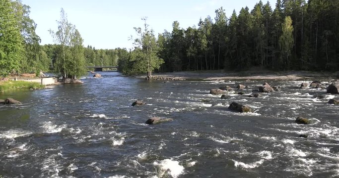 4K Kotka Langinkoski Imperial Fishing Lodge summer day high quality video, green woods, river and bridges in Finland, northern Europe