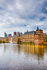 Obraz premium Binnenhof Palace of Parliament inThe Hague in The Netherlands At Daytime. Against Modern Skyscrapers on Background.