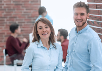 Group of confident business people in meeting.