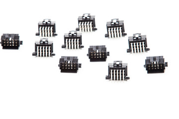 Electronic Components Concepts. Closeup of Rows of Short Angular PCB Connectors or Terminal Blocks...