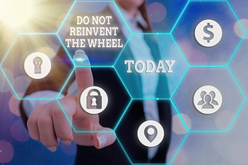 Conceptual hand writing showing Do Not Reinvent The Wheel. Concept meaning stop duplicating a basic...