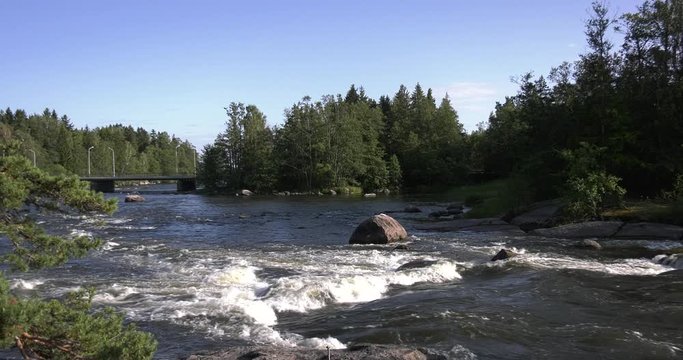 4K Kotka Langinkoski Imperial Fishing Lodge summer day high quality video, green woods, river and bridges in Finland, northern Europe