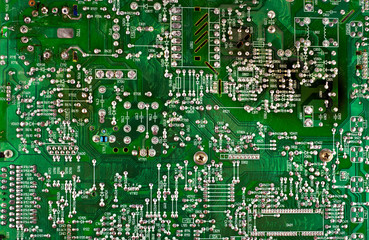 Damaged electronic board with radio parts from electronic device. Top view.