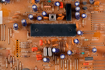 Electronic components on a obsolete printed-circuit board. Top view.